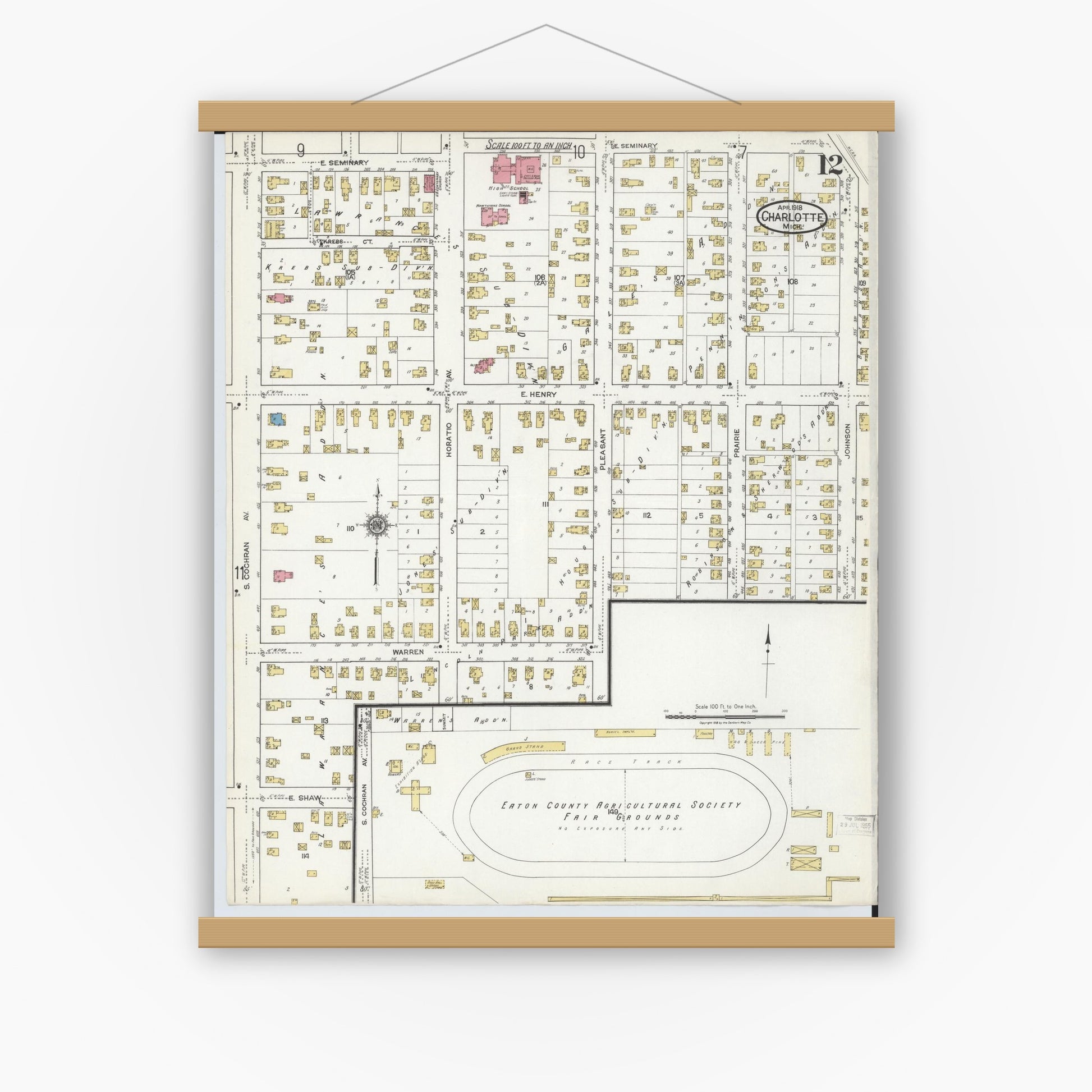 Old map wall art mockup — magnetic wood frame on white wall — Sanborn Fire Insurance Map from Charlotte, Eaton County, Michigan (1918), Sheet #0012
