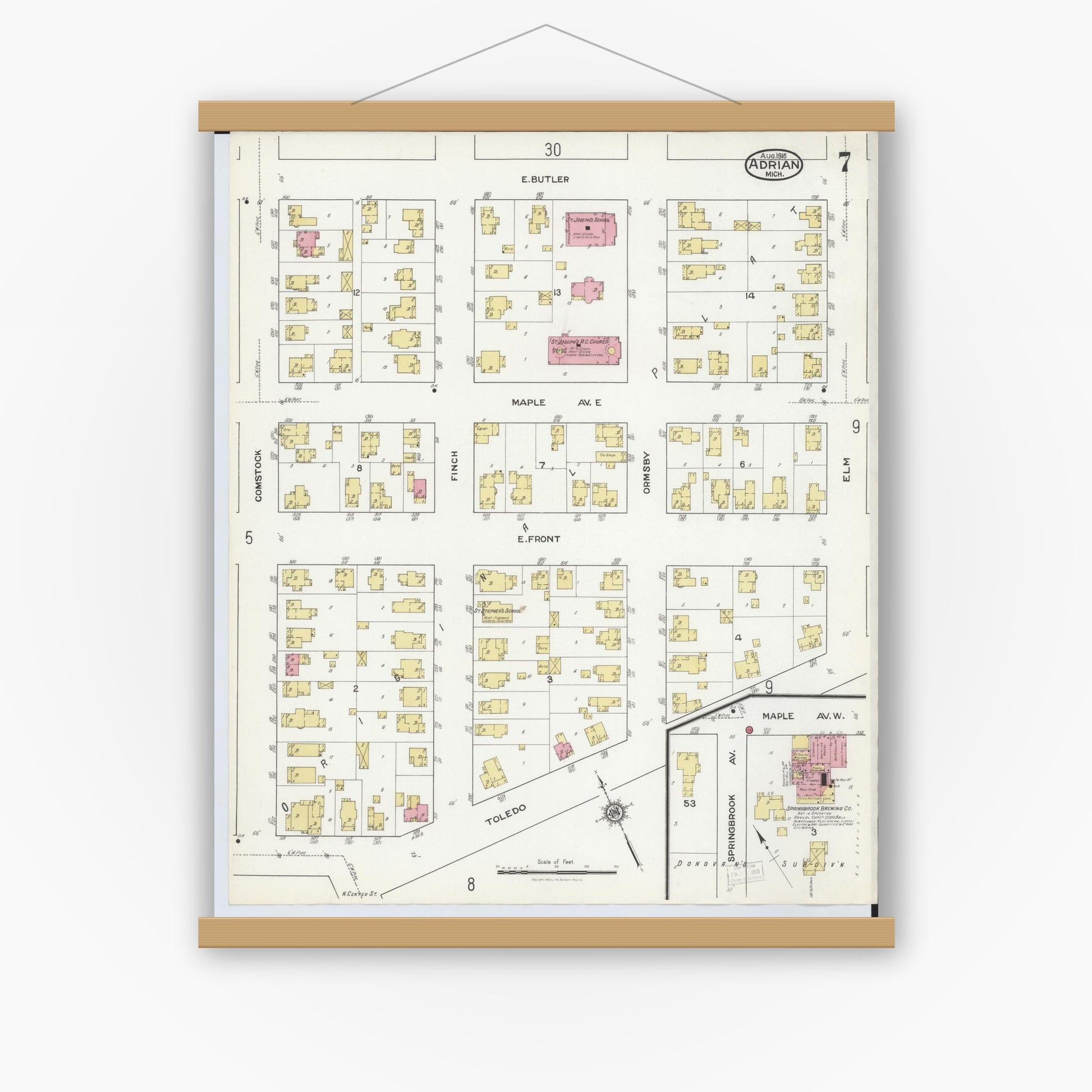 Old map wall art mockup — magnetic wood frame on white wall — Sanborn Fire Insurance Map from Adrian, Lenawee County, Michigan (1916), Sheet #0007