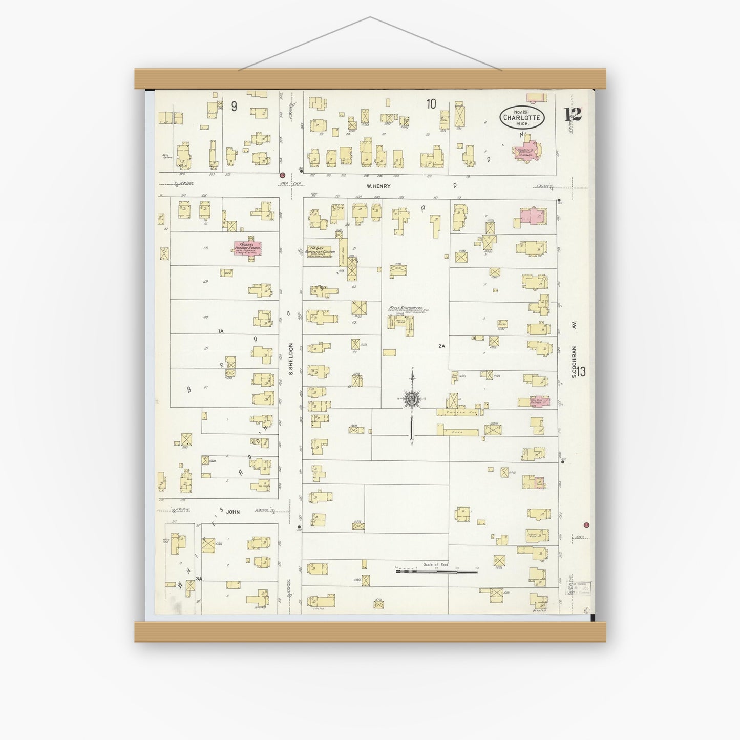 Old map wall art mockup — magnetic wood frame on white wall — Sanborn Fire Insurance Map from Charlotte, Eaton County, Michigan (1911), Sheet #0012
