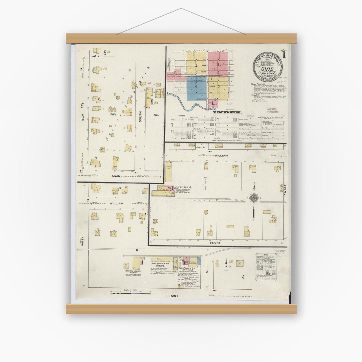 Old map wall art mockup — magnetic wood frame on white wall — Sanborn Fire Insurance Map from Ovid, Clinton County, Michigan (1910) - Complete Map Set