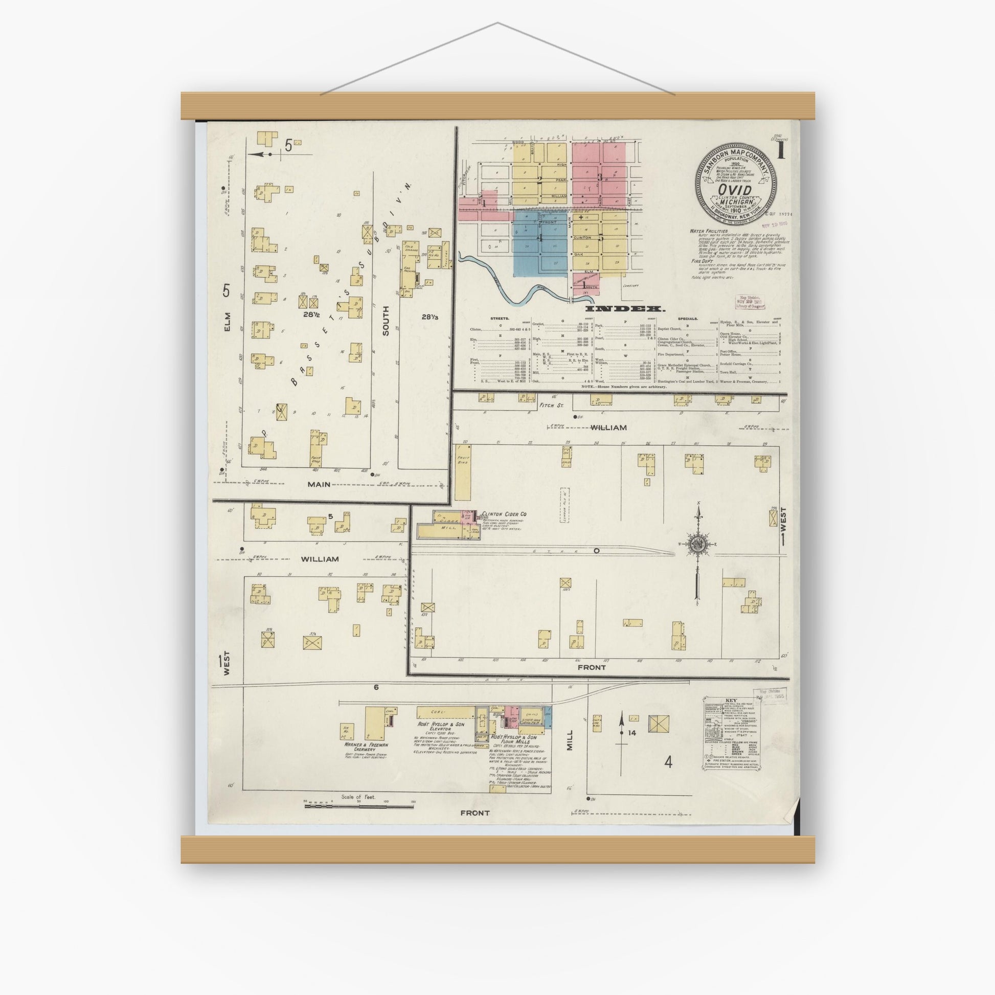 Old map wall art mockup — magnetic wood frame on white wall — Sanborn Fire Insurance Map from Ovid, Clinton County, Michigan (1910) - Complete Map Set