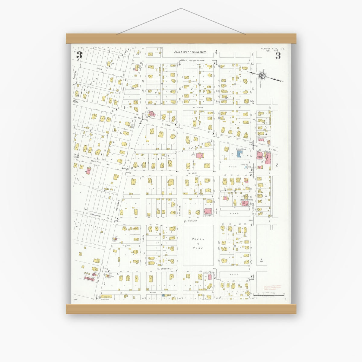 Old map wall art mockup — magnetic wood frame on white wall — Sanborn Fire Insurance Map from Monroe City, Monroe County, Missouri (1933), Sheet #0003