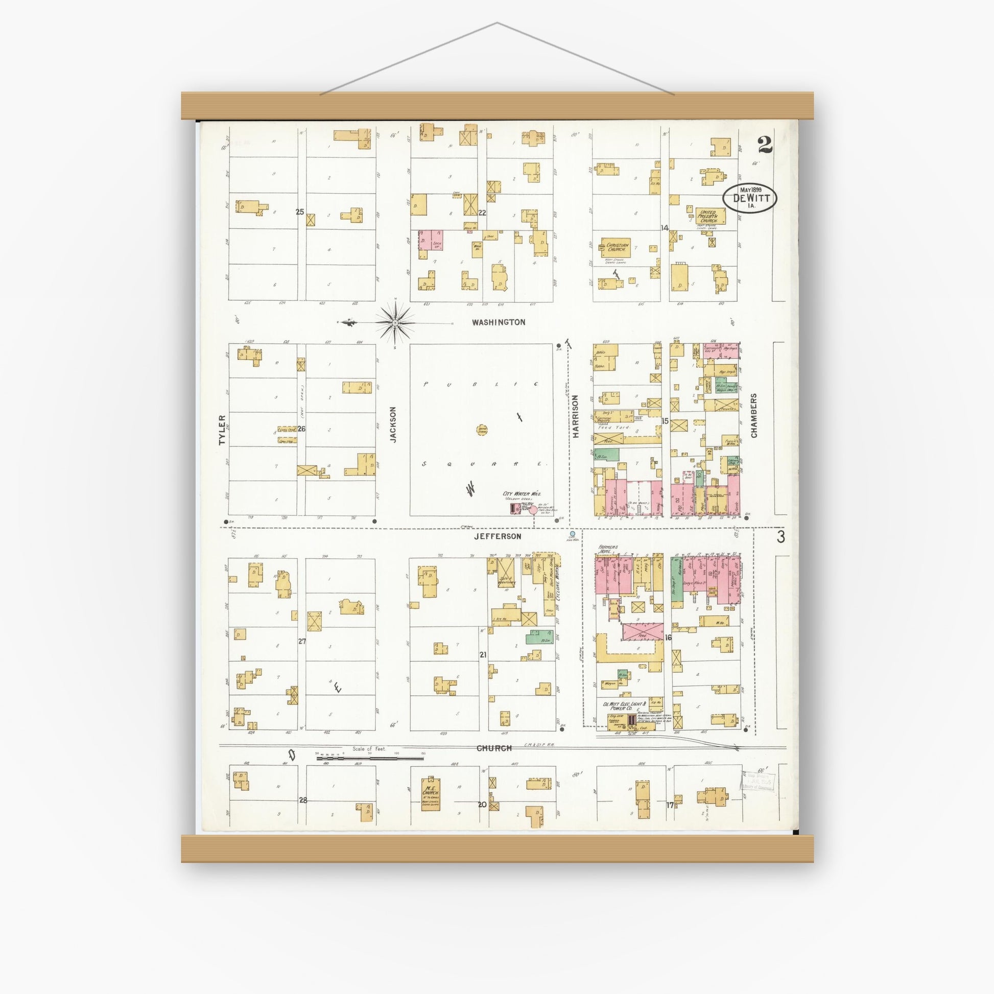 Old map wall art mockup — magnetic wood frame on white wall — Sanborn Fire Insurance Map from De Witt, Clinton County, Iowa (1899), Sheet #0002