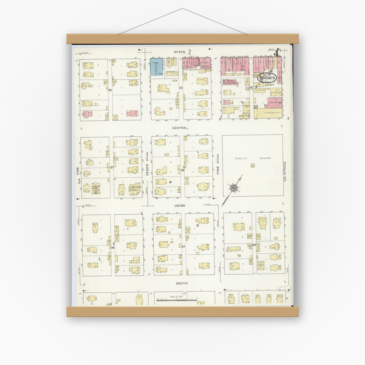 Old map wall art mockup — magnetic wood frame on white wall — Sanborn Fire Insurance Map from Nokomis, Montgomery County, Illinois (1912), Sheet #0004