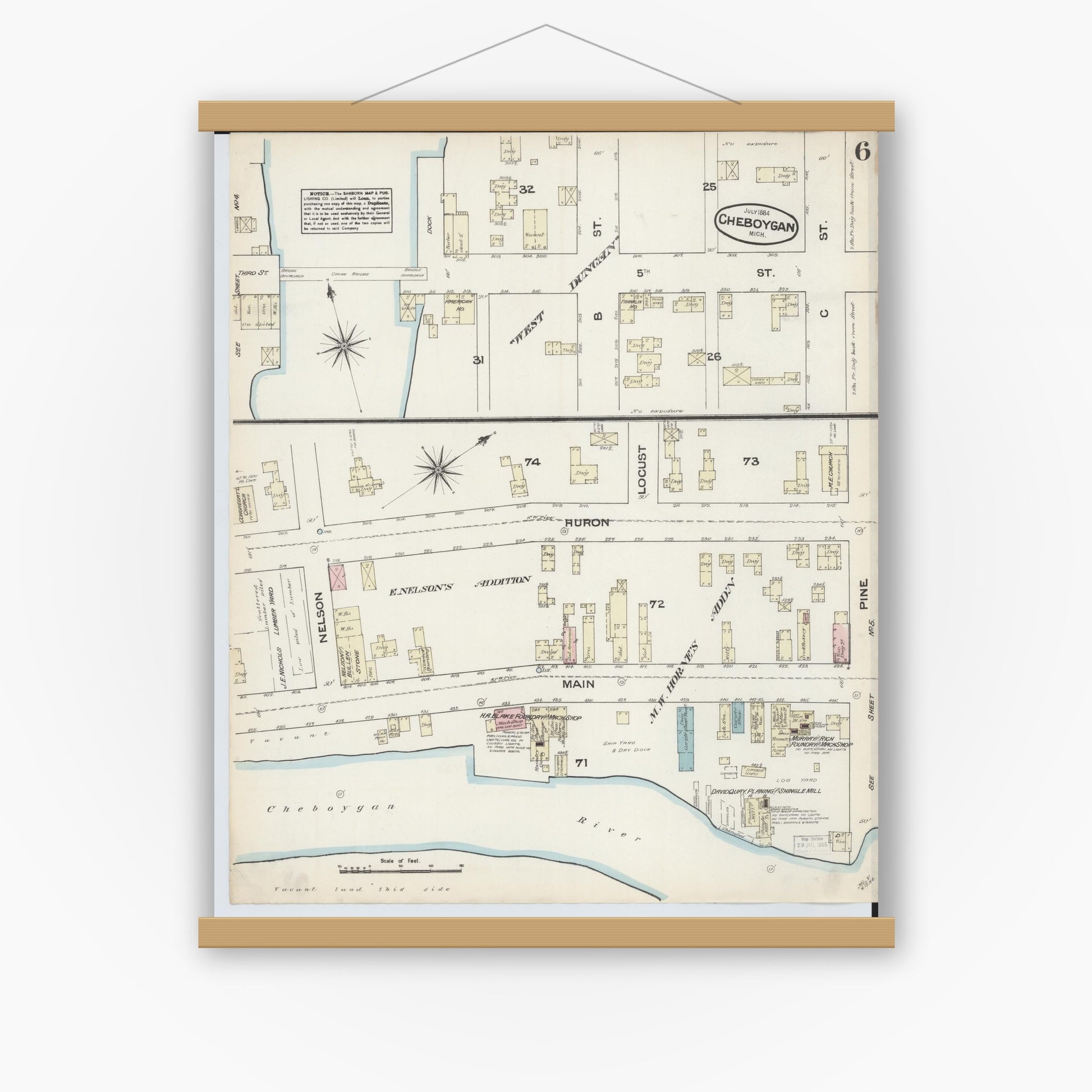 Old map wall art mockup — magnetic wood frame on white wall — Sanborn Fire Insurance Map from Cheboygan, Cheboygan County, Michigan (1884), Sheet #0006