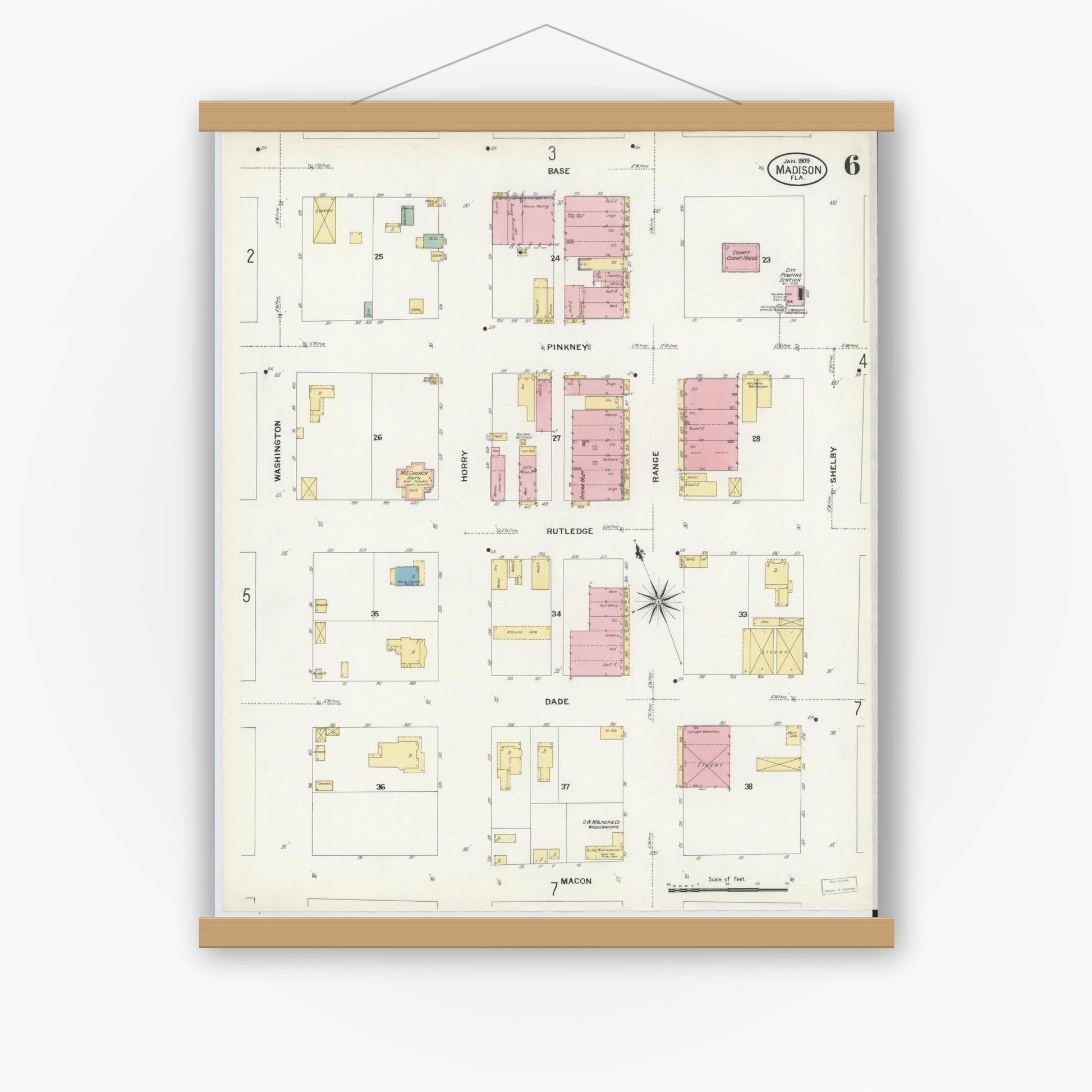 Old map wall art mockup — magnetic wood frame on white wall — Sanborn Fire Insurance Map from Madison, Madison County, Florida (1909), Sheet #0006