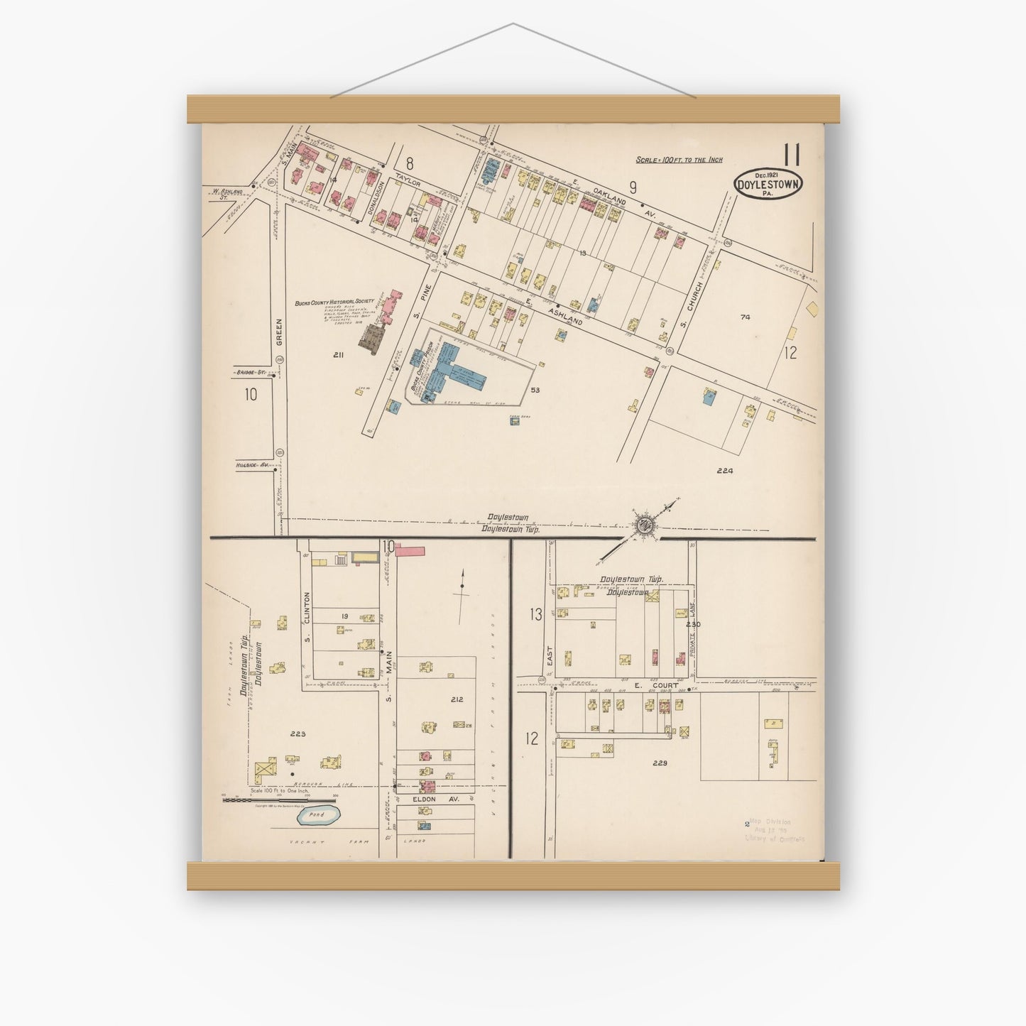 Old map wall art mockup — magnetic wood frame on white wall — Sanborn Fire Insurance Map from Doylestown, Bucks County, Pennsylvania (1922), Sheet #0011