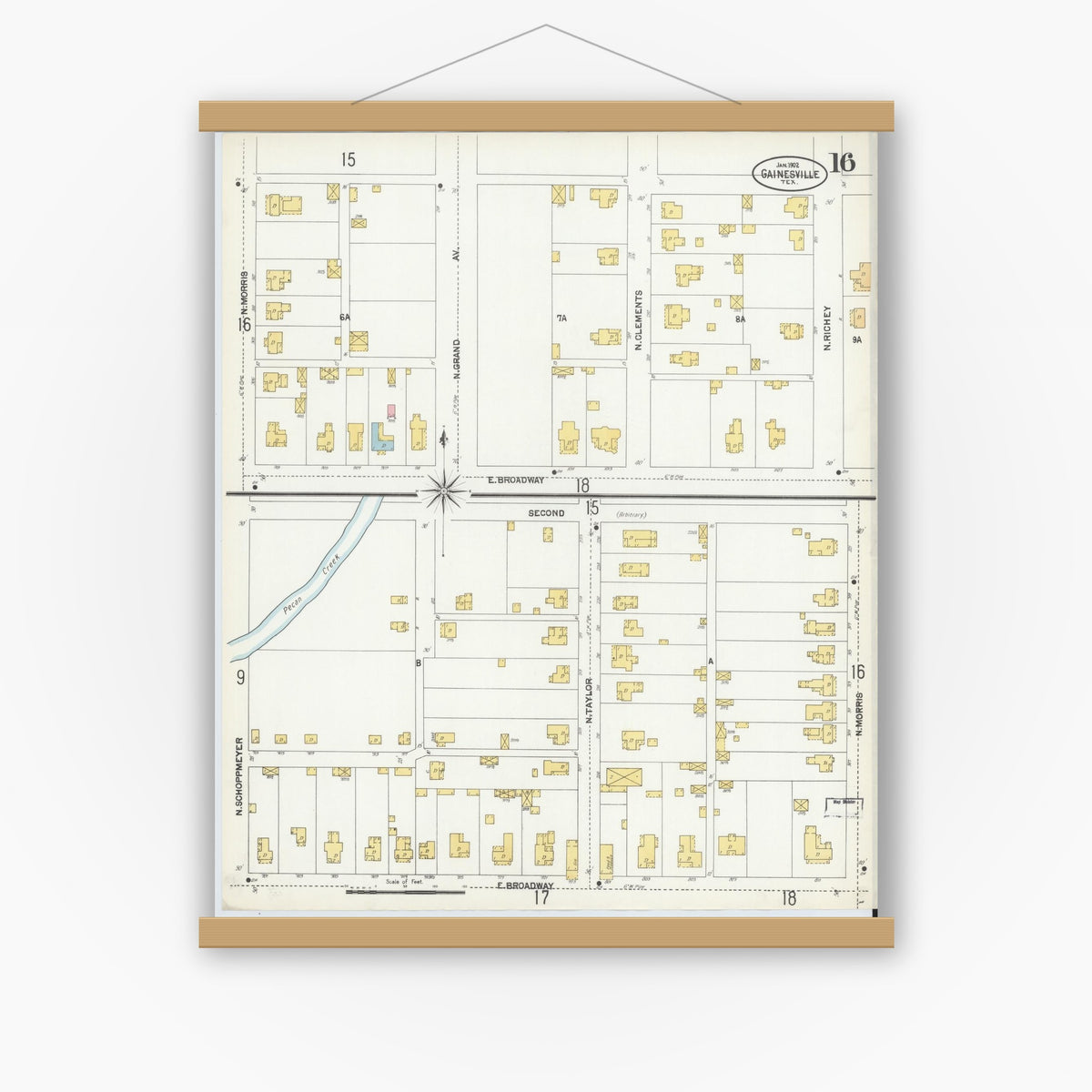 Old map wall art mockup — magnetic wood frame on white wall — Sanborn Fire Insurance Map from Gainesville, Cooke County, Texas (1902), Sheet #0016