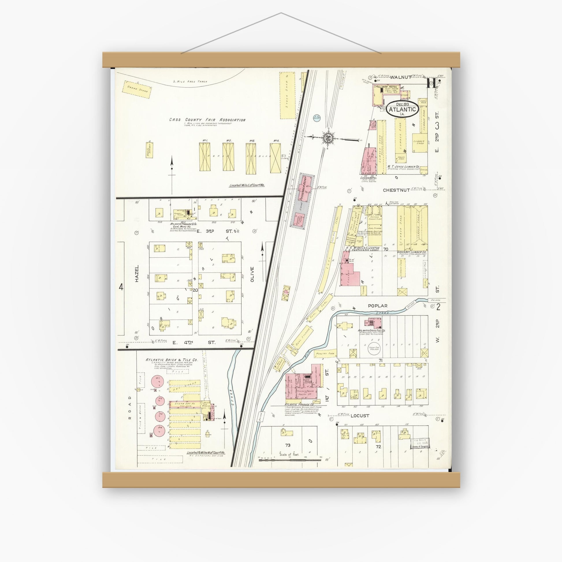 Old map wall art mockup — magnetic wood frame on white wall — Sanborn Fire Insurance Map from Atlantic, Cass County, Iowa (1913), Sheet #0011