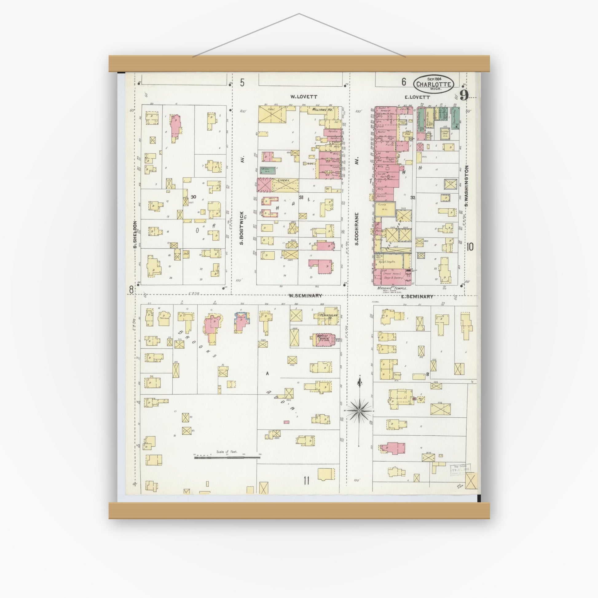 Old map wall art mockup — magnetic wood frame on white wall — Sanborn Fire Insurance Map from Charlotte, Eaton County, Michigan (1904), Sheet #0009