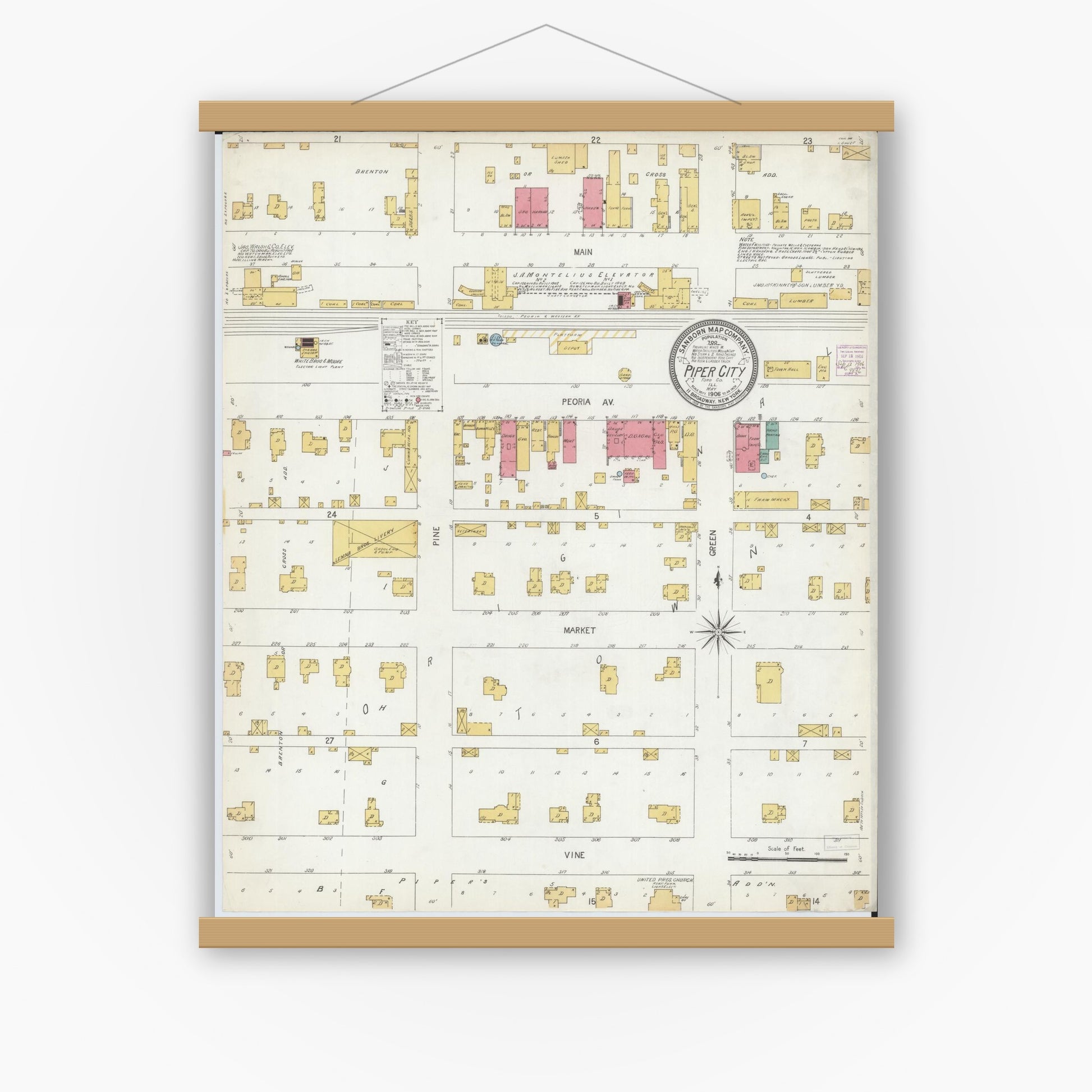 Old map wall art mockup — magnetic wood frame on white wall — Sanborn Fire Insurance Map from Piper City, Ford County, Illinois (1906), Sheet #0001