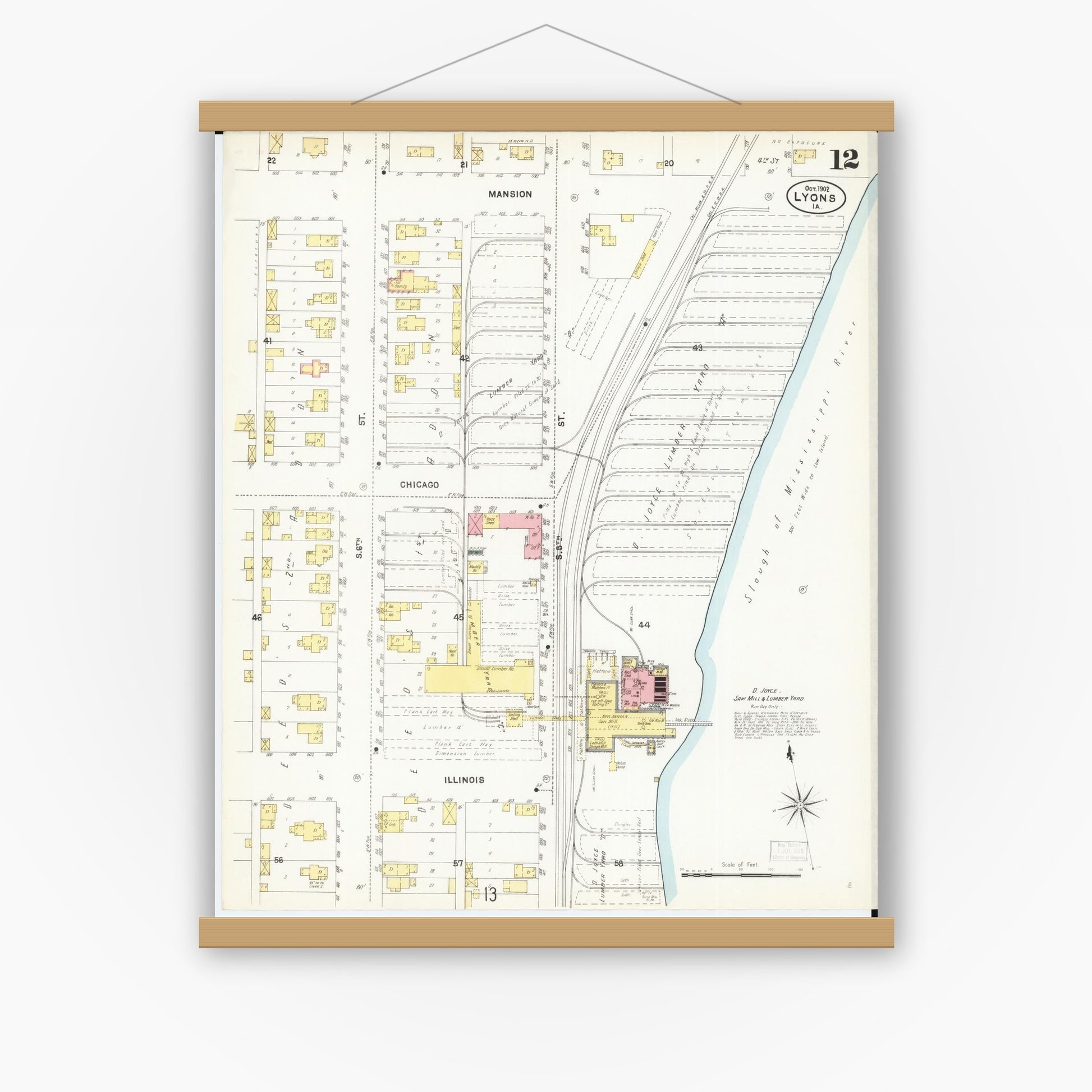 Old map wall art mockup — magnetic wood frame on white wall — Sanborn Fire Insurance Map from Lyons, Clinton County, Iowa (1902), Sheet #0012