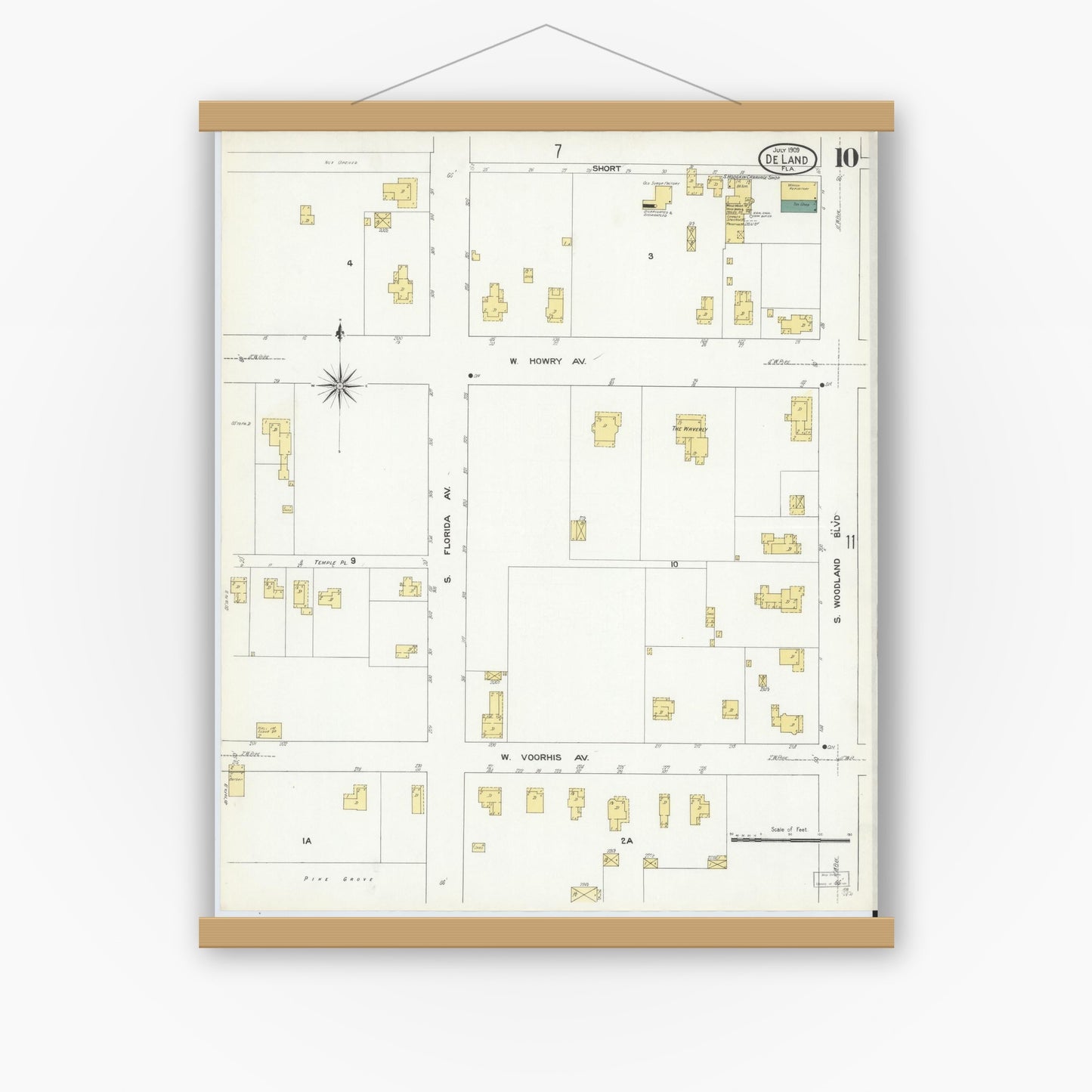 Old map wall art mockup — magnetic wood frame on white wall — Sanborn Fire Insurance Map from De Land, Volusia County, Florida (1909), Sheet #0010
