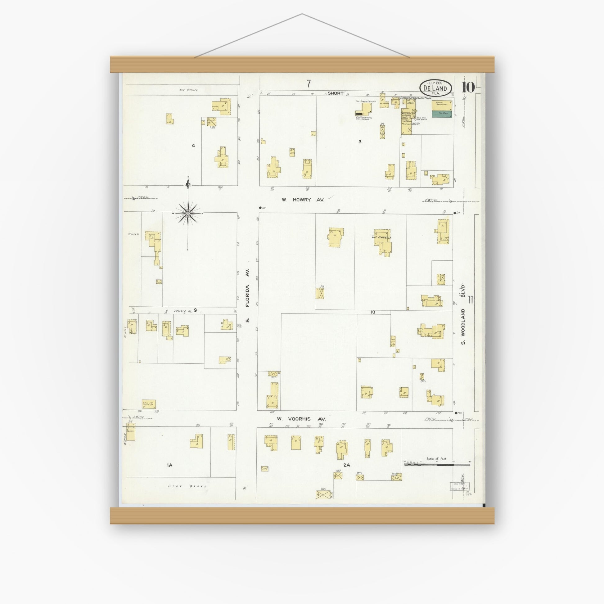 Old map wall art mockup — magnetic wood frame on white wall — Sanborn Fire Insurance Map from De Land, Volusia County, Florida (1909), Sheet #0010