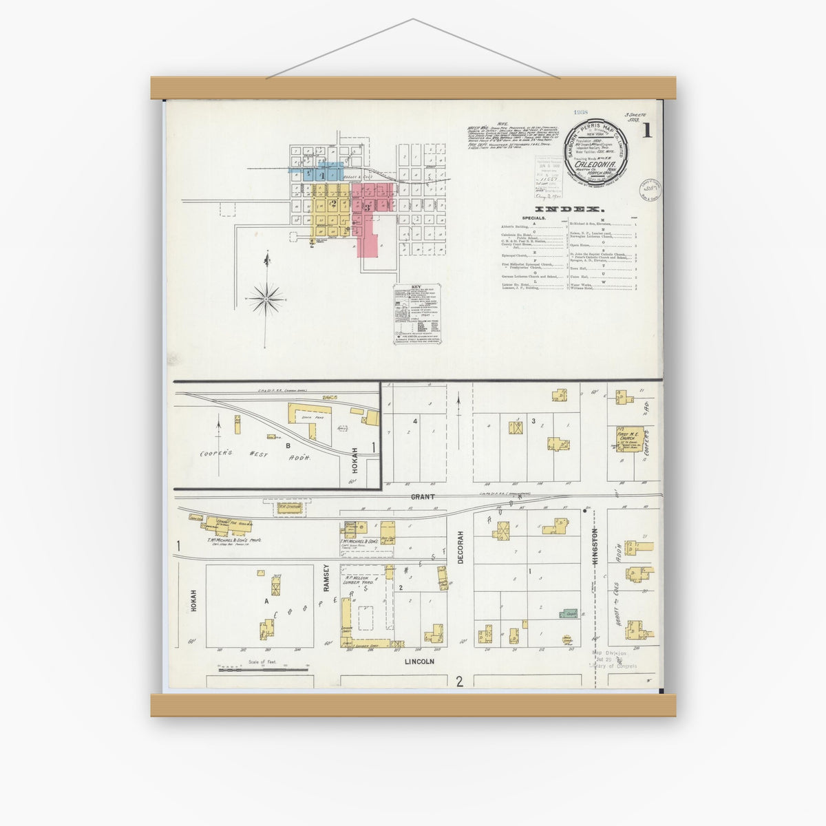 Old map wall art mockup — magnetic wood frame on white wall — Sanborn Fire Insurance Map from Caledonia, Houston County, Minnesota (1900) - Complete Map Set