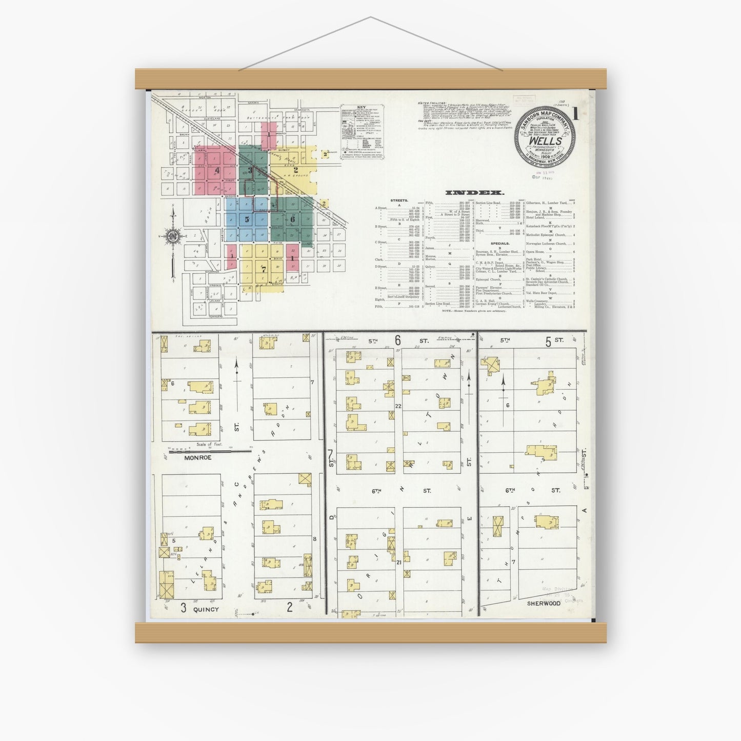 Old map wall art mockup — magnetic wood frame on white wall — Sanborn Fire Insurance Map from Wells, Faribault County, Minnesota (1909) - Complete Map Set