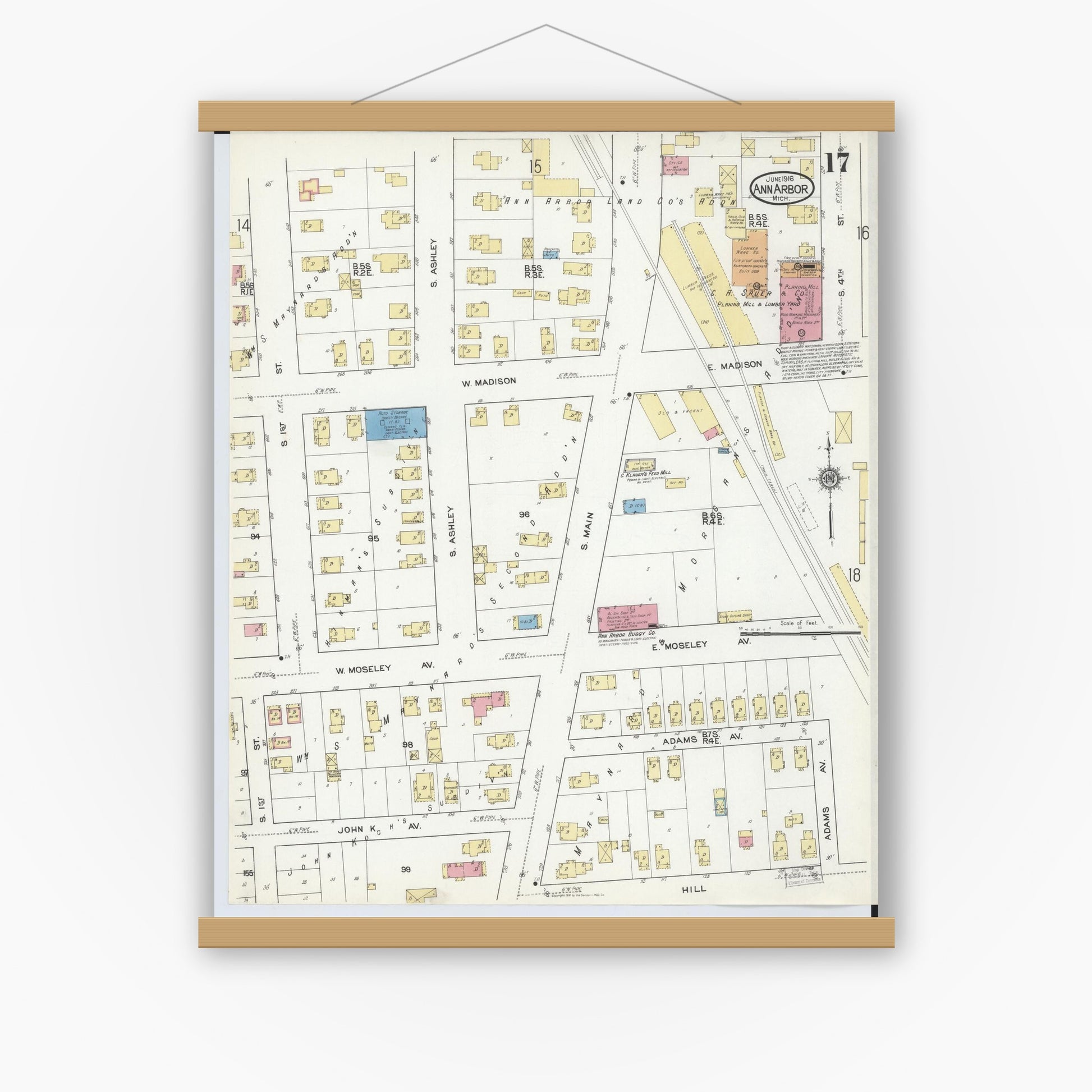 Old map wall art mockup — magnetic wood frame on white wall — Sanborn Fire Insurance Map from Ann Arbor, Washtenaw County, Michigan (1916), Sheet #0017