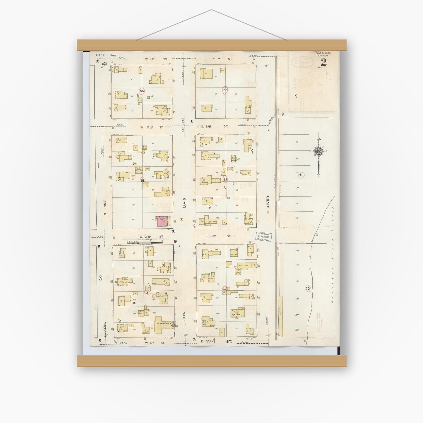 Old map wall art mockup — magnetic wood frame on white wall — Sanborn Fire Insurance Map from Evart, Osceola County, Michigan (1942), Sheet #0002