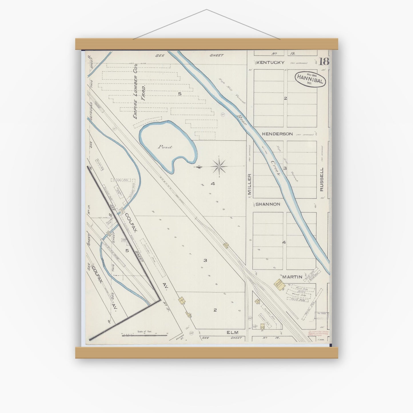 Old map wall art mockup — magnetic wood frame on white wall — Sanborn Fire Insurance Map from Hannibal, Marion County, Missouri (1885), Sheet #0018