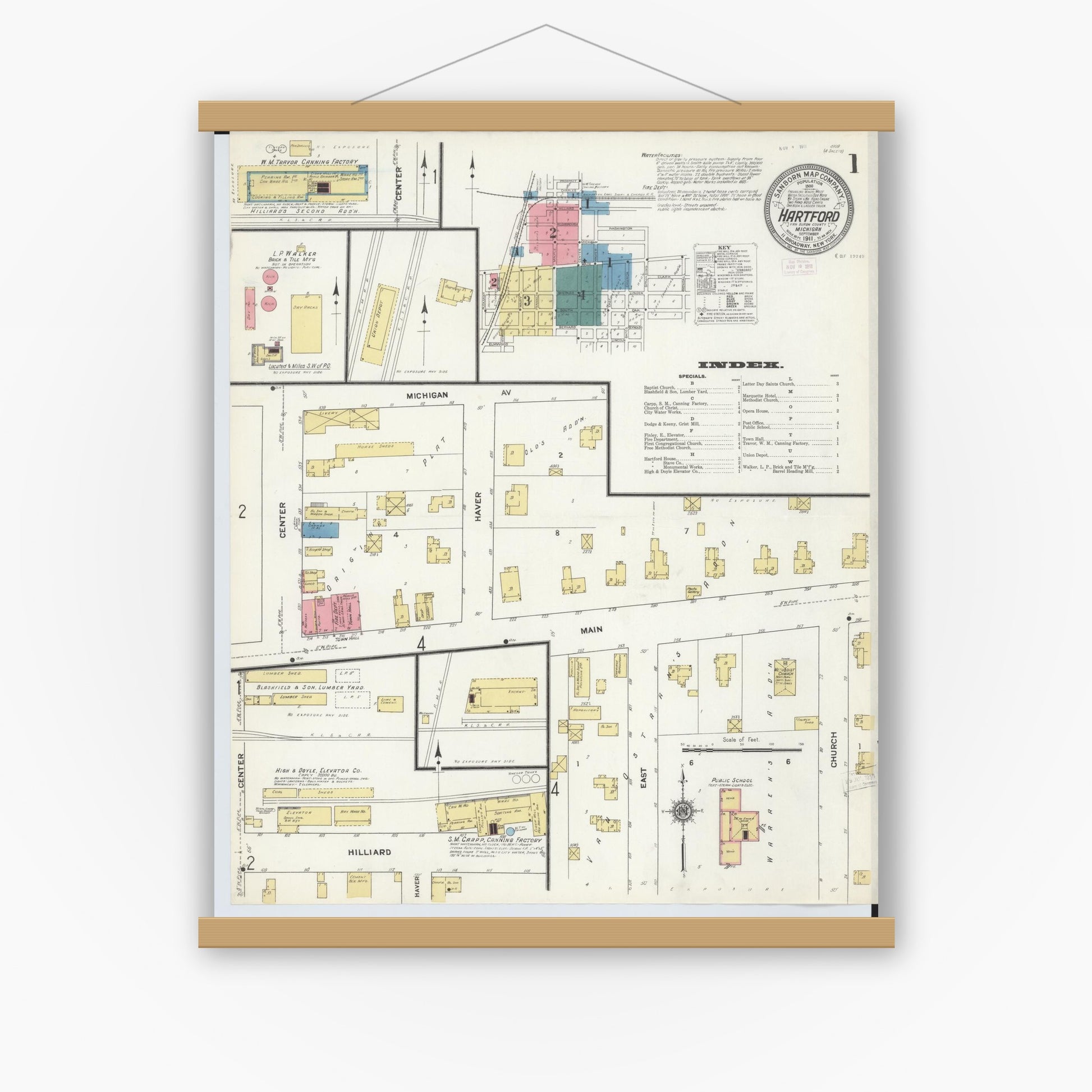 Old map wall art mockup — magnetic wood frame on white wall — Sanborn Fire Insurance Map from Hartford, Van Buren County, Michigan (1911) - Complete Map Set