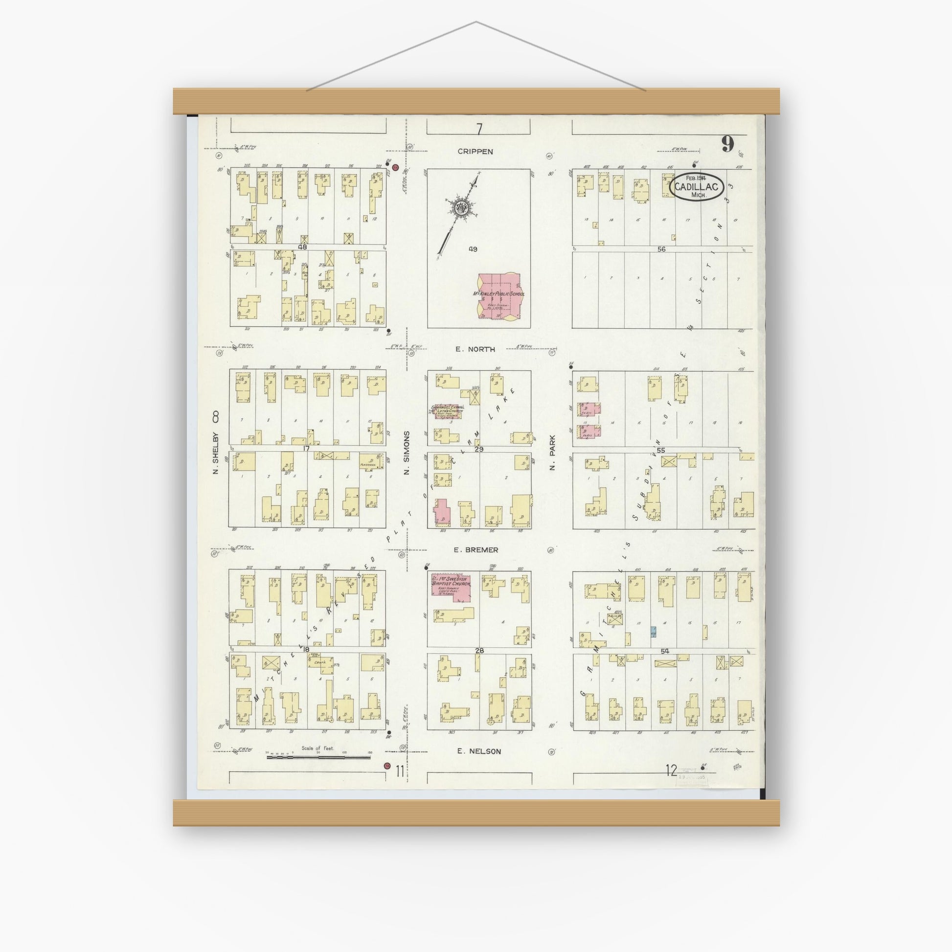 Old map wall art mockup — magnetic wood frame on white wall — Sanborn Fire Insurance Map from Cadillac, Wexford County, Michigan (1914), Sheet #0009
