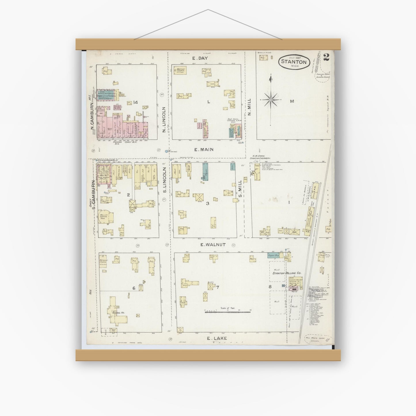 Old map wall art mockup — magnetic wood frame on white wall — Sanborn Fire Insurance Map from Stanton, Montcalm County, Michigan (1887), Sheet #0002