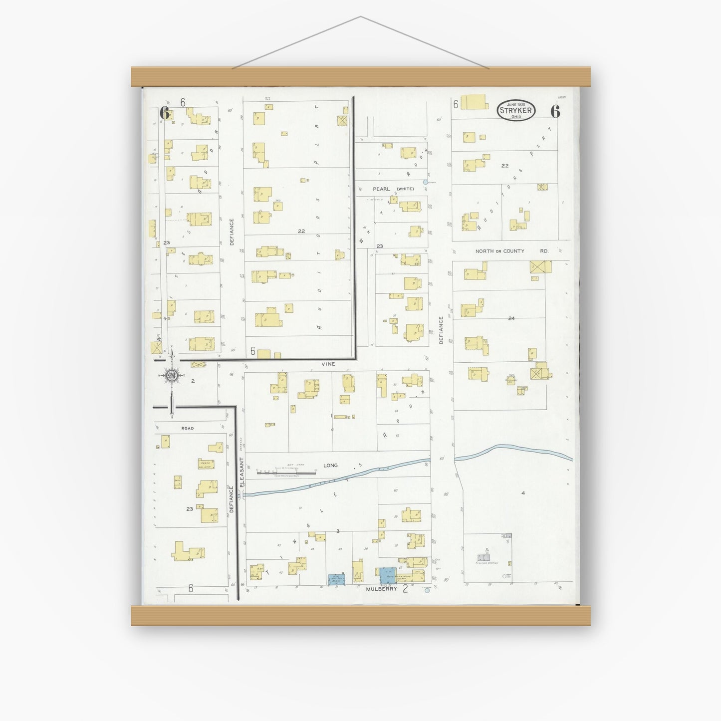 Old map wall art mockup — magnetic wood frame on white wall — Sanborn Fire Insurance Map from Stryker, Williams County, Ohio (1930), Sheet #0006