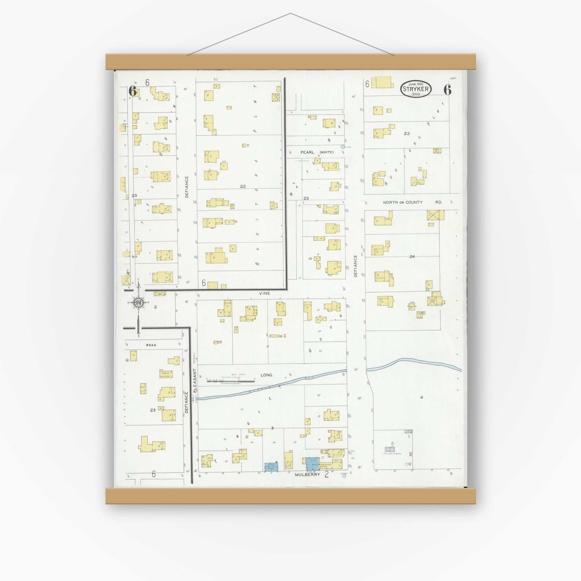 Old map wall art mockup — magnetic wood frame on white wall — Sanborn Fire Insurance Map from Stryker, Williams County, Ohio (1930), Sheet #0006