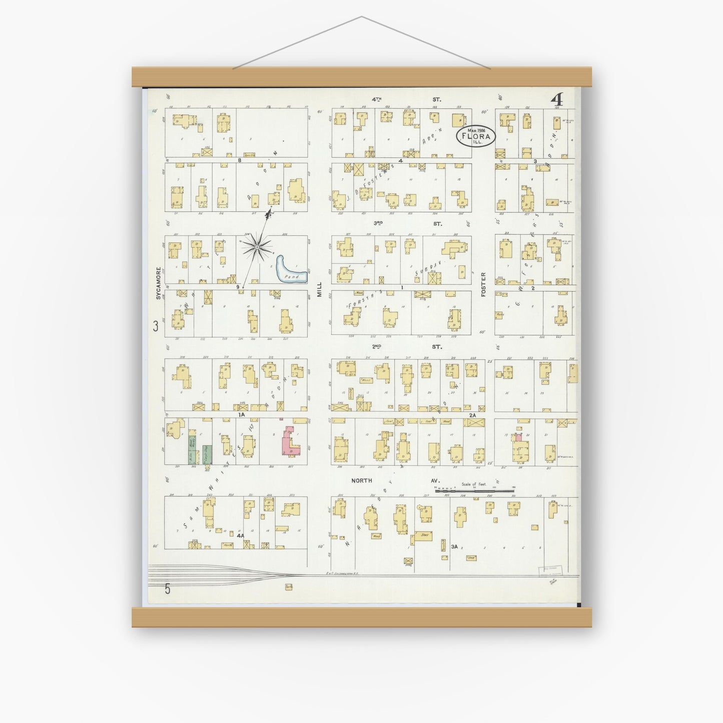 Old map wall art mockup — magnetic wood frame on white wall — Sanborn Fire Insurance Map from Flora, Clay County, Illinois (1906), Sheet #0004