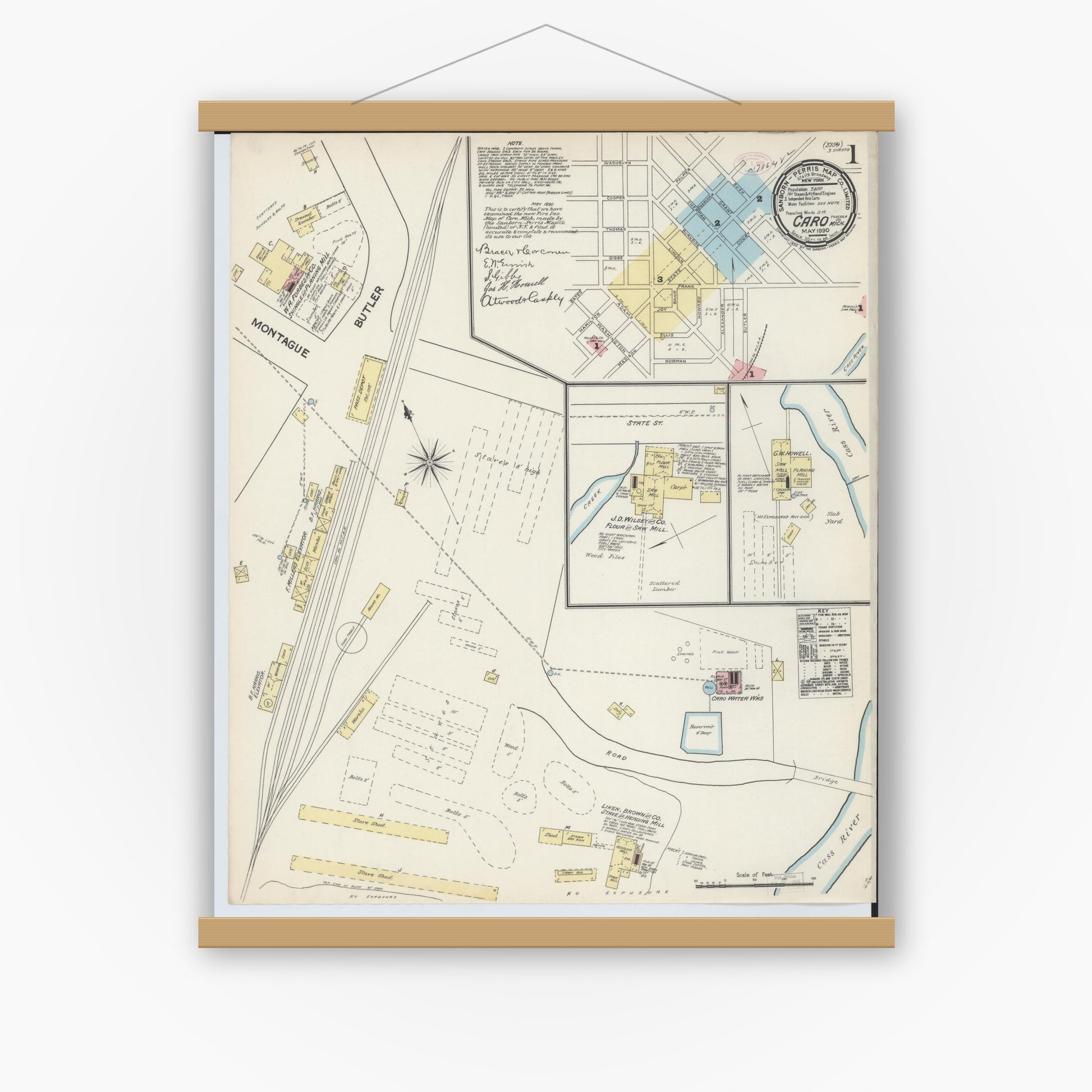 Old map wall art mockup — magnetic wood frame on white wall — Sanborn Fire Insurance Map from Caro, Tuscola County, Michigan (1890), Sheet #0001