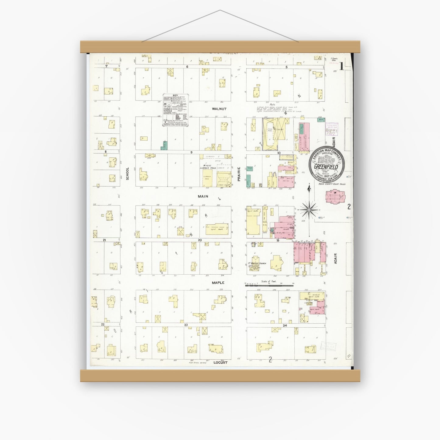Old map wall art mockup — magnetic wood frame on white wall — Sanborn Fire Insurance Map from Greenfield, Adair County, Iowa (1907) â€” Complete Set