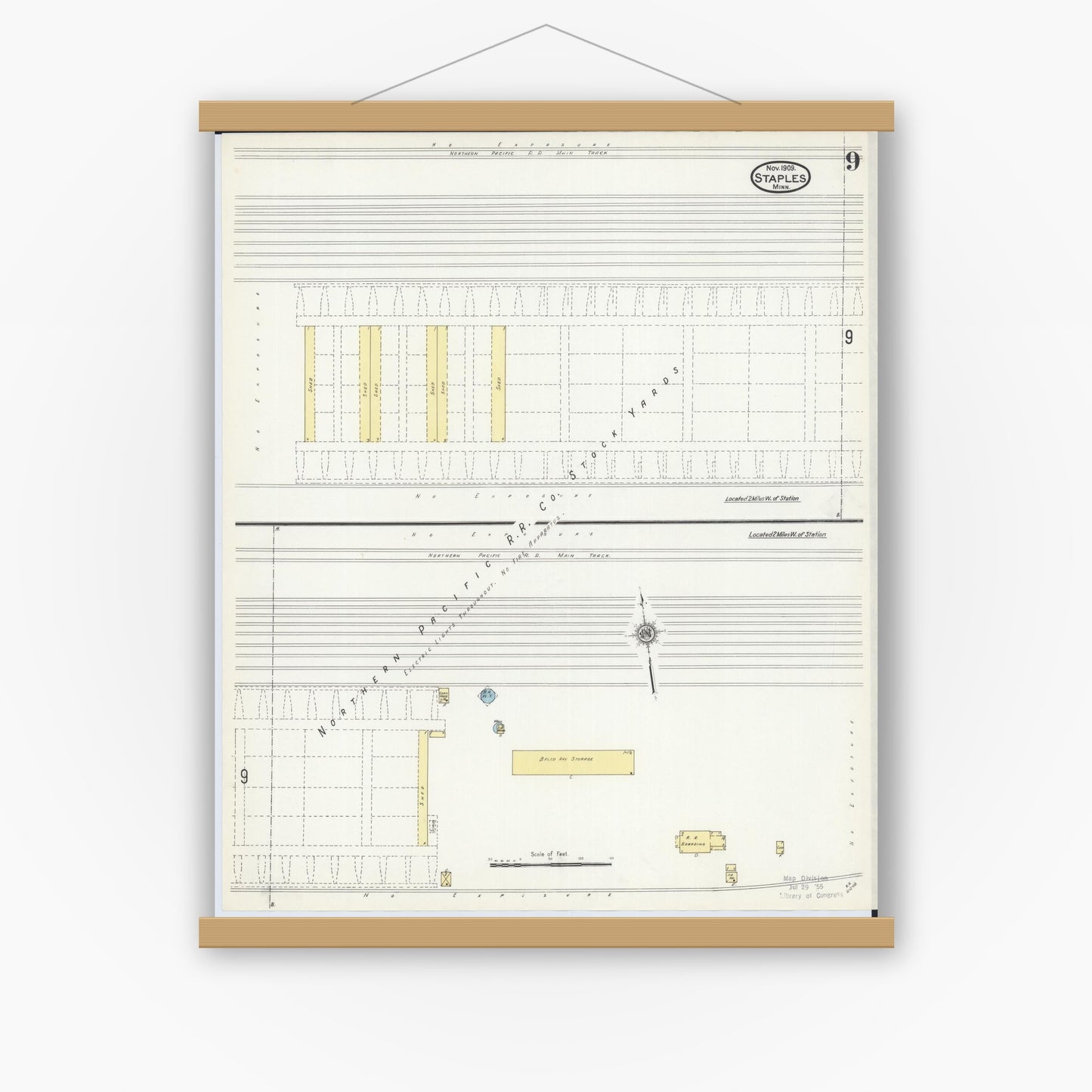Old map wall art mockup — magnetic wood frame on white wall — Sanborn Fire Insurance Map from Staples, Todd County, Minnesota (1909), Sheet #0009