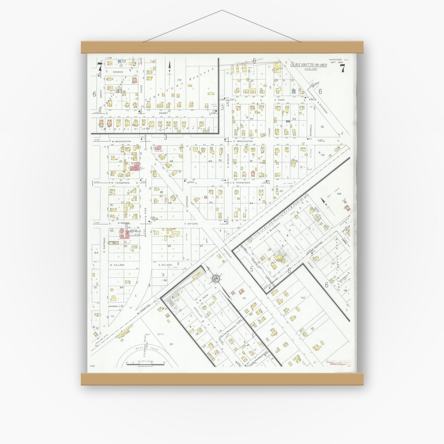 Old map wall art mockup — magnetic wood frame on white wall — Sanborn Fire Insurance Map from Harvard, McHenry County, Illinois (1934), Sheet #0007