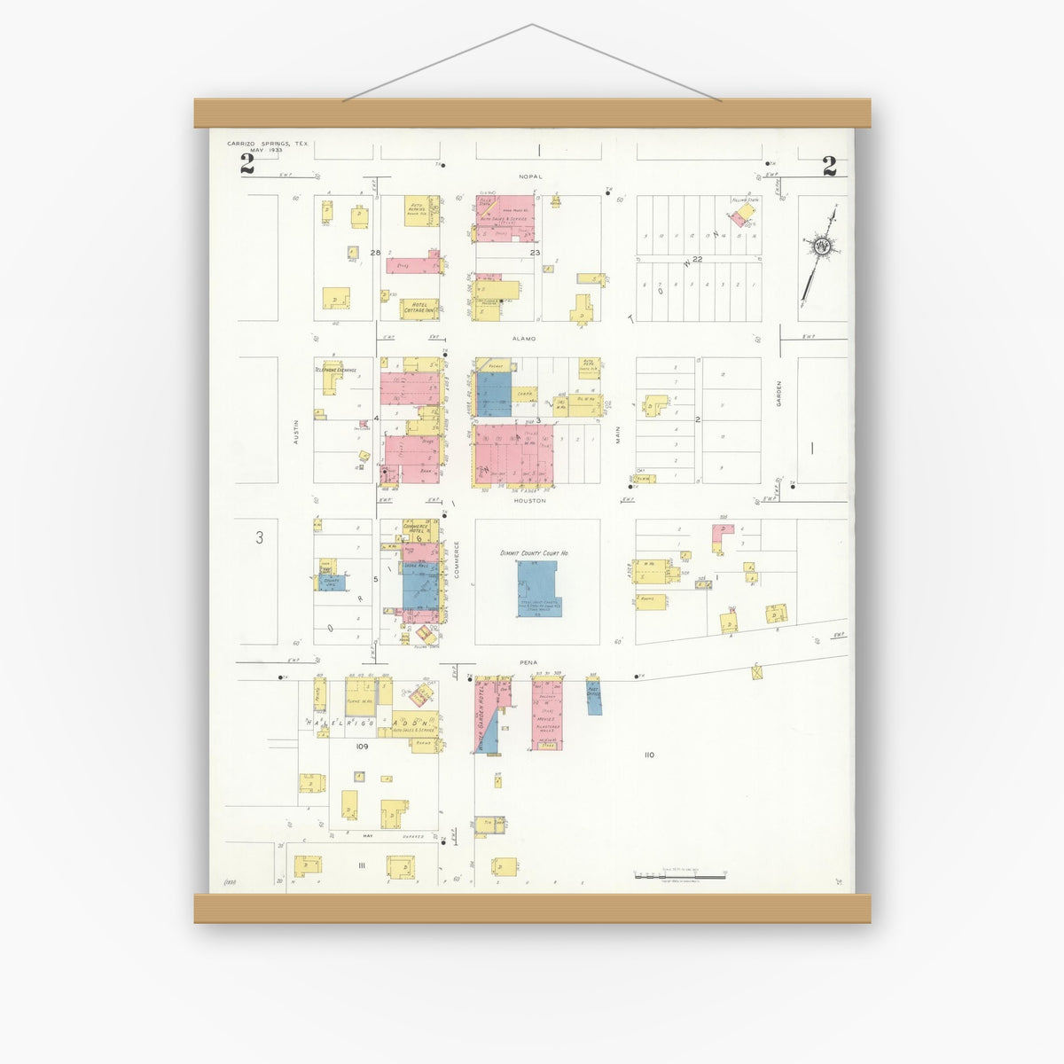 Old map wall art mockup — magnetic wood frame on white wall — Sanborn Fire Insurance Map from Carrizo Springs, Dimmit County, Texas (1933), Sheet #0002