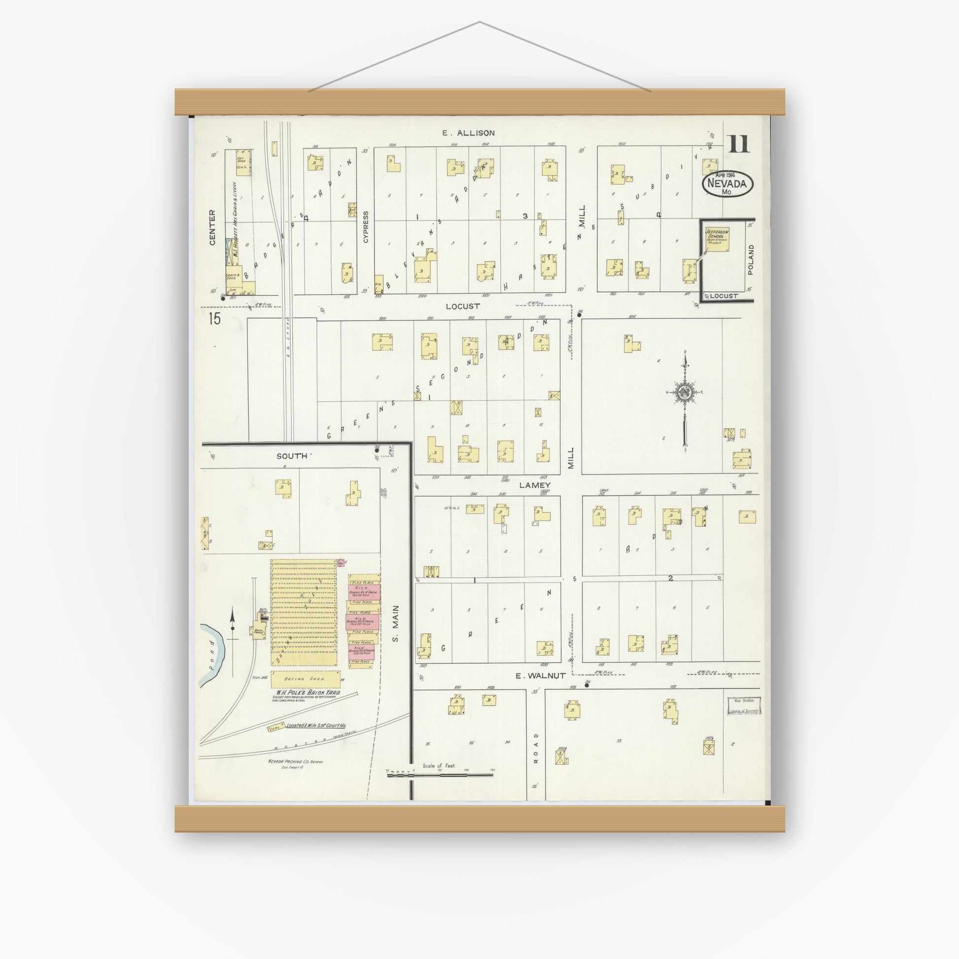 Old map wall art mockup — magnetic wood frame on white wall — Sanborn Fire Insurance Map from Nevada, Vernon County, Missouri (1914), Sheet #0011