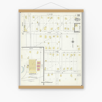 Old map wall art mockup — magnetic wood frame on white wall — Sanborn Fire Insurance Map from Nevada, Vernon County, Missouri (1914), Sheet #0011