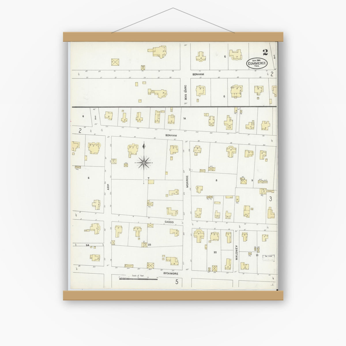 Old map wall art mockup — magnetic wood frame on white wall — Sanborn Fire Insurance Map from Commerce, Hunt County, Texas (1906), Sheet #0002