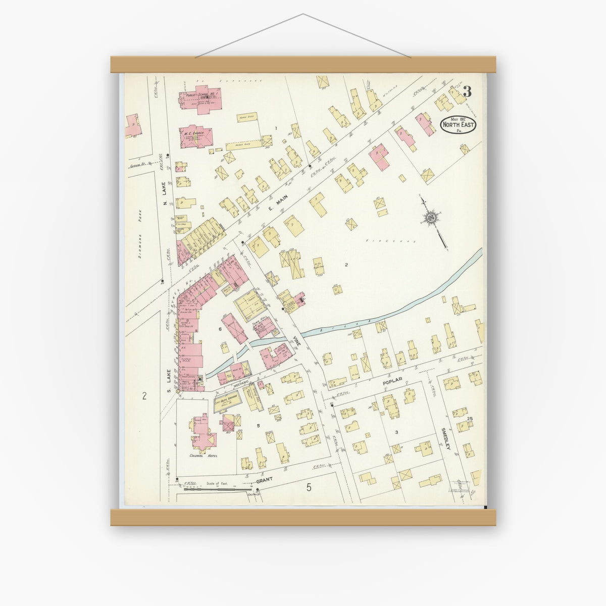 Old map wall art mockup — magnetic wood frame on white wall — Sanborn Fire Insurance Map from North East, Erie County, Pennsylvania (1912), Sheet #0003
