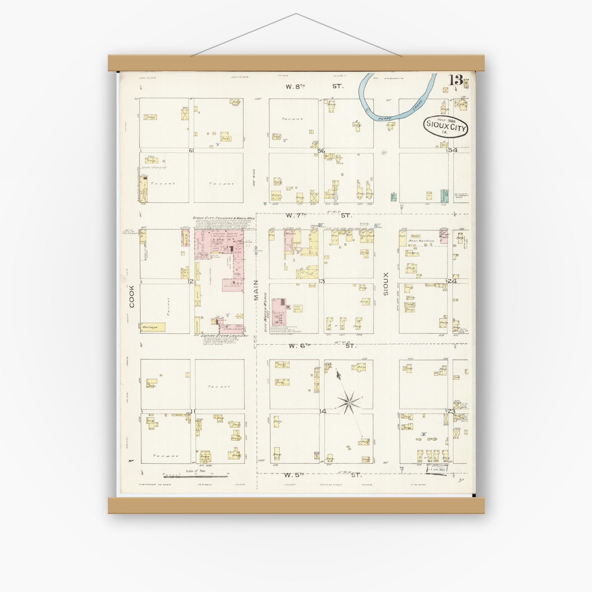 Old map wall art mockup — magnetic wood frame on white wall — Sanborn Fire Insurance Map from Sioux City, Woodbury County, Iowa (1886), Sheet #0013