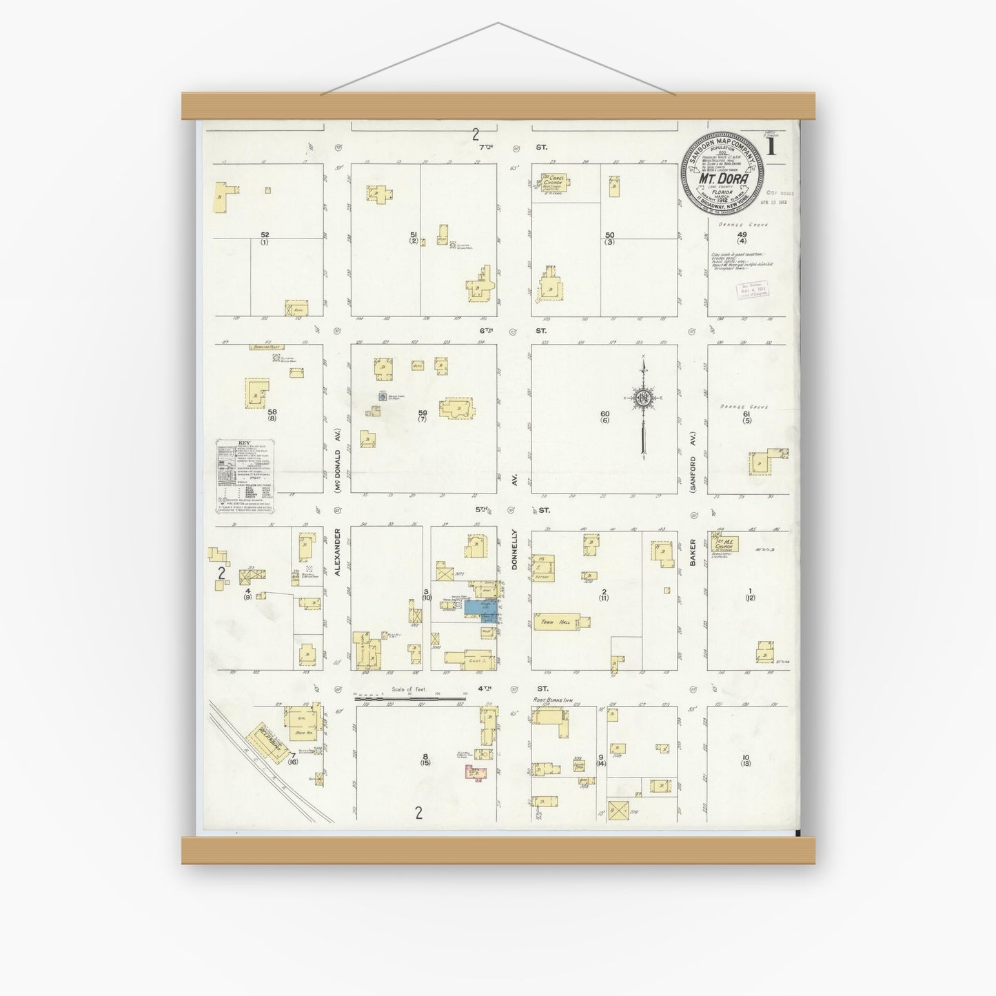 Old map wall art mockup — magnetic wood frame on white wall — Sanborn Fire Insurance Map from Mount Dora, Lake County, Florida (1912), Sheet #0001