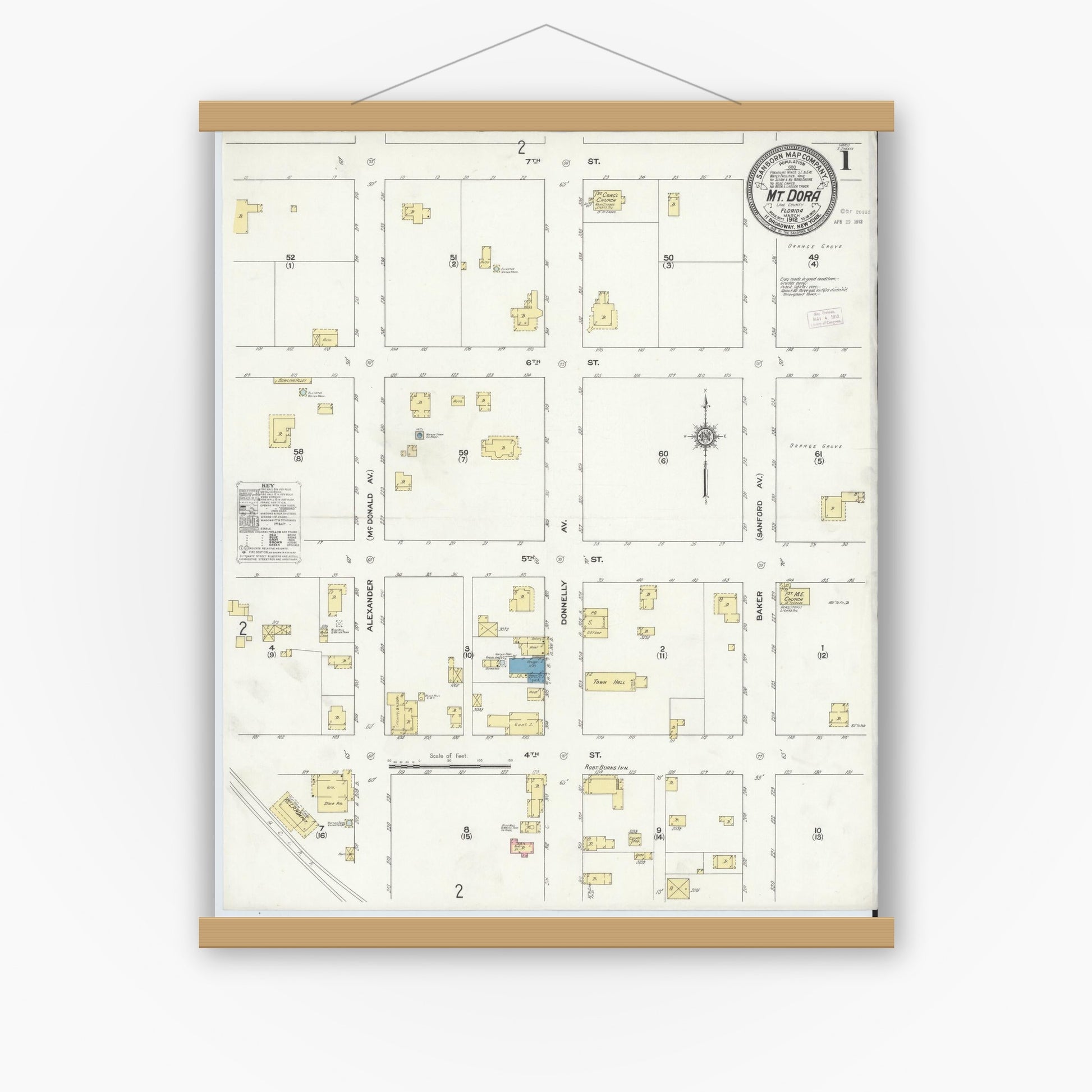 Old map wall art mockup — magnetic wood frame on white wall — Sanborn Fire Insurance Map from Mount Dora, Lake County, Florida (1912), Sheet #0001