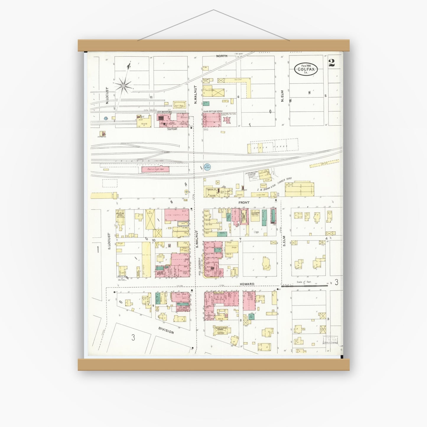 Old map wall art mockup — magnetic wood frame on white wall — Sanborn Fire Insurance Map from Colfax, Jasper County, Iowa (1906), Sheet #0002