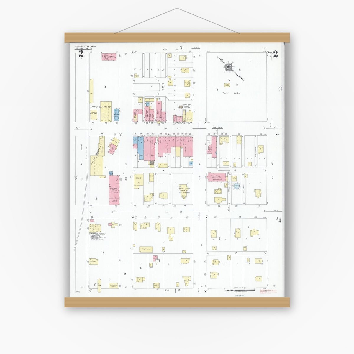 Old map wall art mockup — magnetic wood frame on white wall — Sanborn Fire Insurance Map from Heron Lake, Jackson County, Minnesota (1947), Sheet #0002