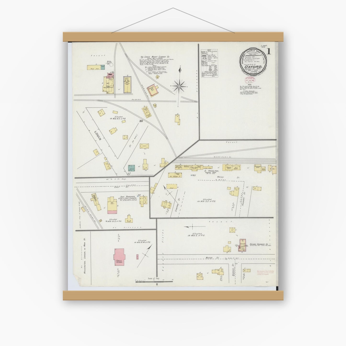 Old map wall art mockup — magnetic wood frame on white wall — Sanborn Fire Insurance Map from Oxford, Oakland County, Michigan (1895) - Complete Map Set