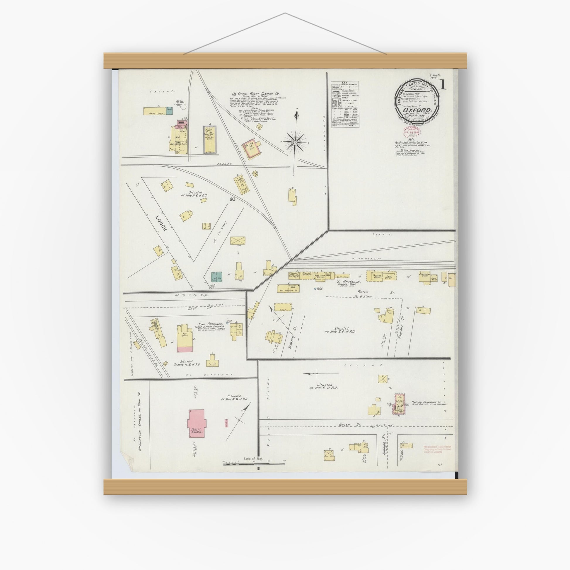 Old map wall art mockup — magnetic wood frame on white wall — Sanborn Fire Insurance Map from Oxford, Oakland County, Michigan (1895) - Complete Map Set