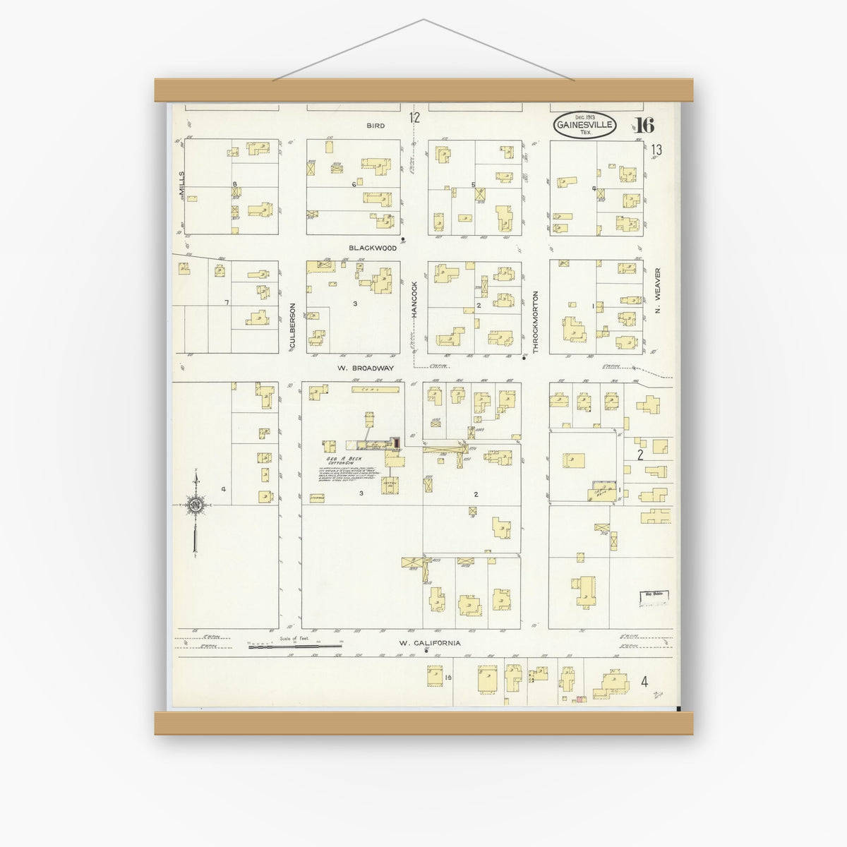 Old map wall art mockup — magnetic wood frame on white wall — Sanborn Fire Insurance Map from Gainesville, Cooke County, Texas (1913), Sheet #0016