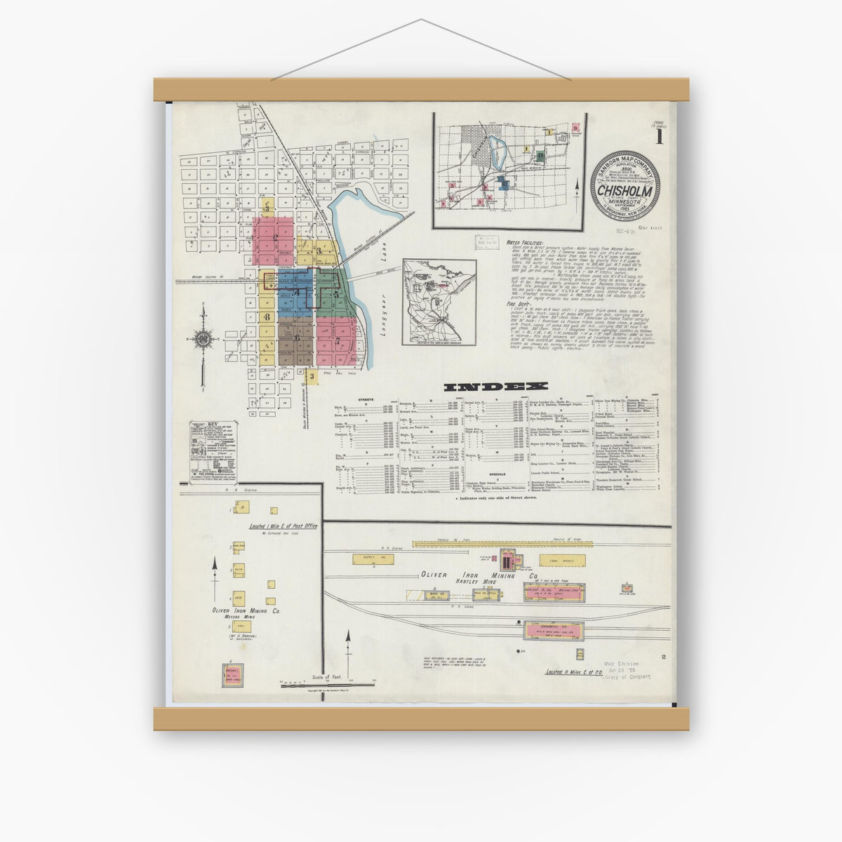Old map wall art mockup — magnetic wood frame on white wall — Sanborn Fire Insurance Map from Chisholm, Saint Louis County, Minnesota (1921), Sheet #0001