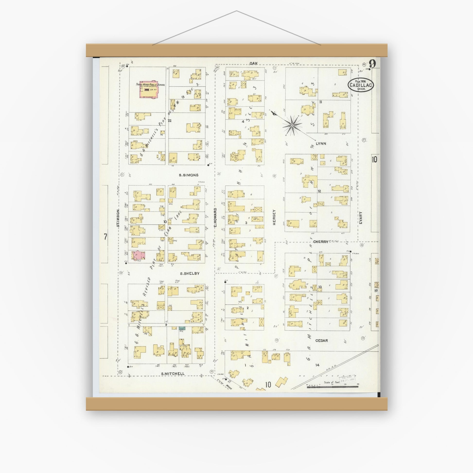 Old map wall art mockup — magnetic wood frame on white wall — Sanborn Fire Insurance Map from Cadillac, Wexford County, Michigan (1906), Sheet #0009