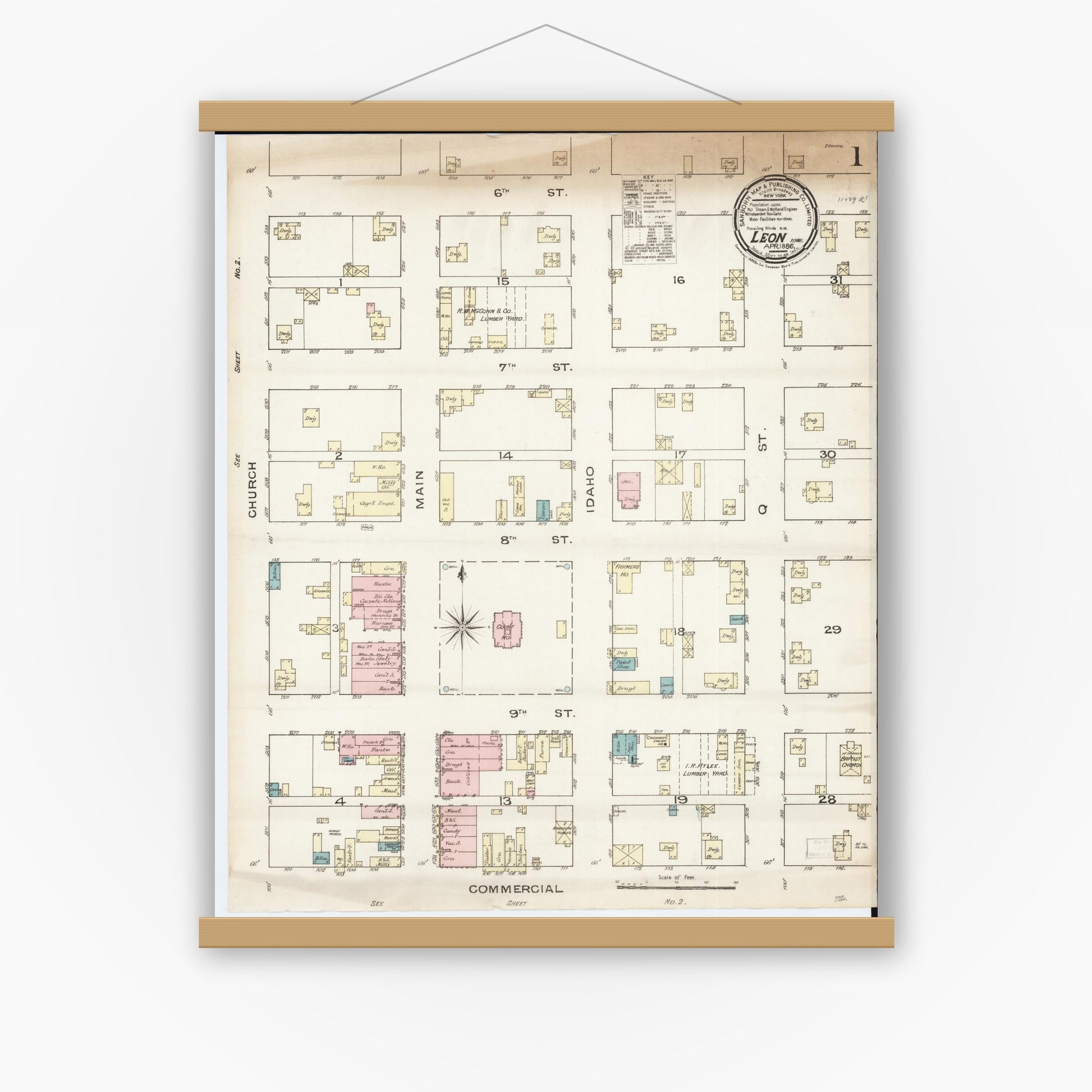 Old map wall art mockup — magnetic wood frame on white wall — Sanborn Fire Insurance Map from Leon, Decatur County, Iowa (1886) â€” Complete Set