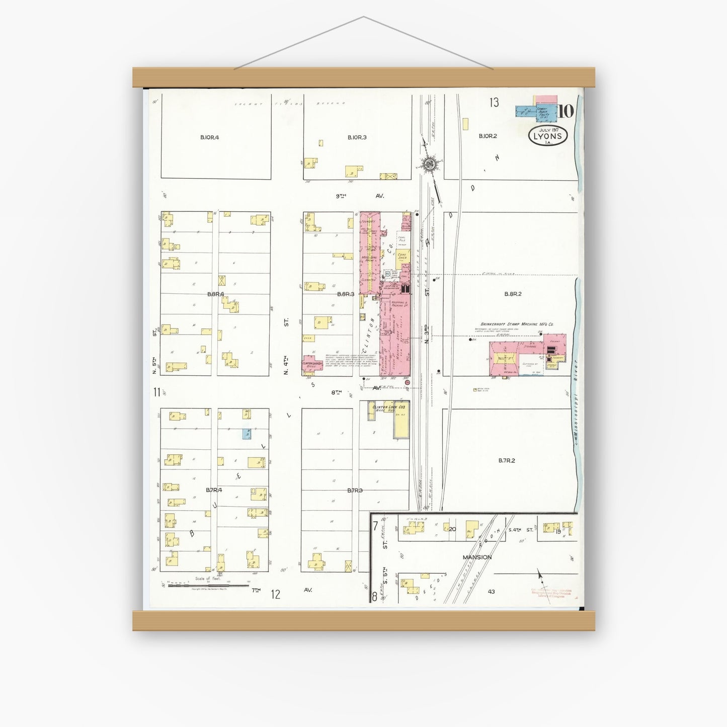 Old map wall art mockup — magnetic wood frame on white wall — Sanborn Fire Insurance Map from Lyons, Clinton County, Iowa (1917), Sheet #0010
